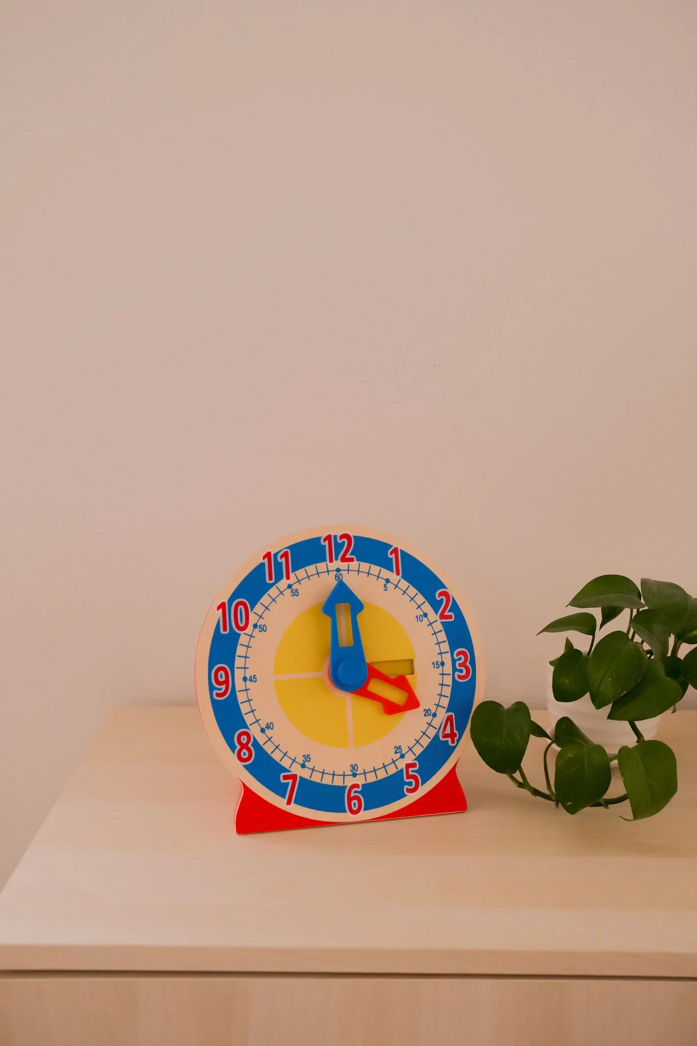 Learning Clock, an open-ended toy on Raise Wildflowers